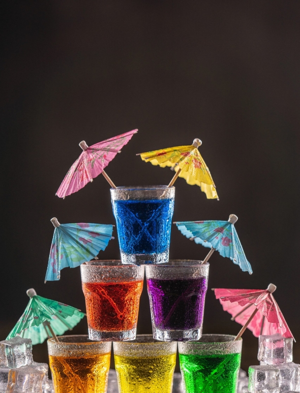 colorful-cocktails-with-umbrellas-and-ice-cube-bas-2026-03-16-03-25-49-utc